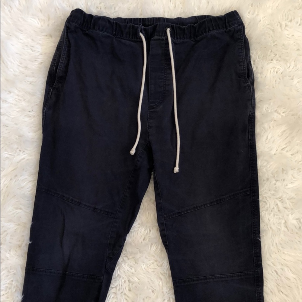 Men’s Navy Joggers with white string tie.
